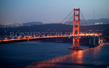 Golden Gate Bridge at twilight reflected in the Bay